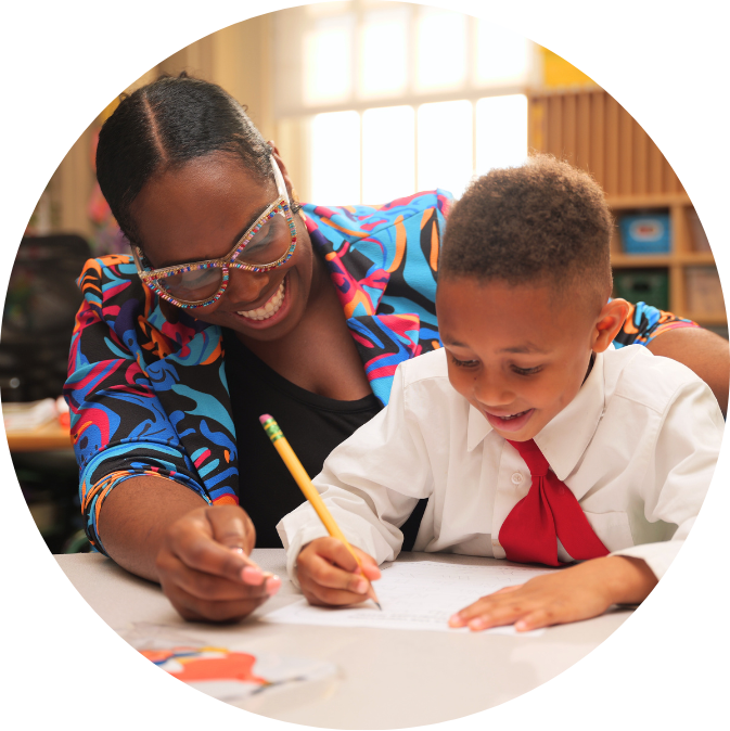 A TNAACS teacher working with a student